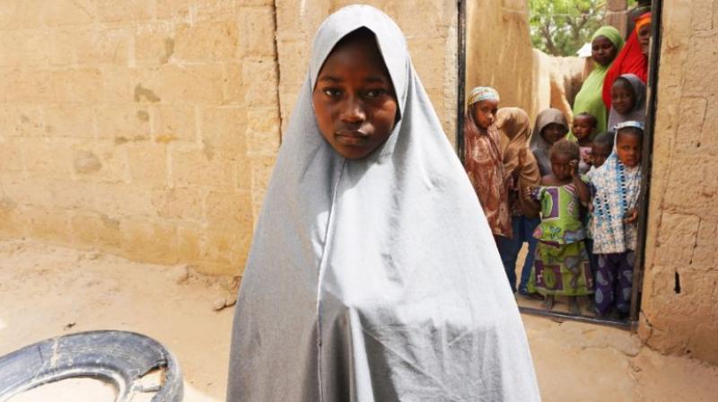 On Monday night, terrified pupils fled the boarding school night when heavily armed fighters in military fatigues and turbans stormed the town, shouting ‘Allahu Akbar.’ (Representational Image/ AFP) On Monday night, terrified pupils fled the boarding school night when heavily armed fighters in military fatigues and turbans stormed the town, shouting ‘Allahu Akbar.’ (Representational Image/ AFP)