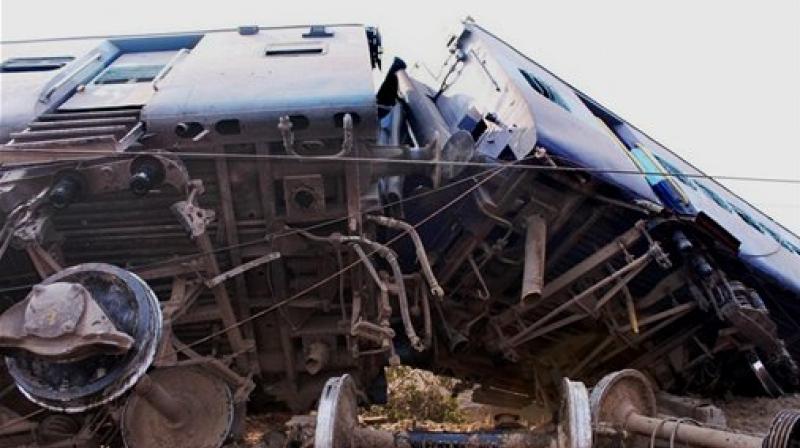 Wreckage of the Ajmer-Sealdah express train which derailed early morning near Rura railway station in Kanpur Dehat district of Uttar Pradesh on Wednesday. (Photo: AP) Wreckage of the Ajmer-Sealdah express train which derailed early morning near Rura railway station in Kanpur Dehat district of Uttar Pradesh on Wednesday. (Photo: AP)