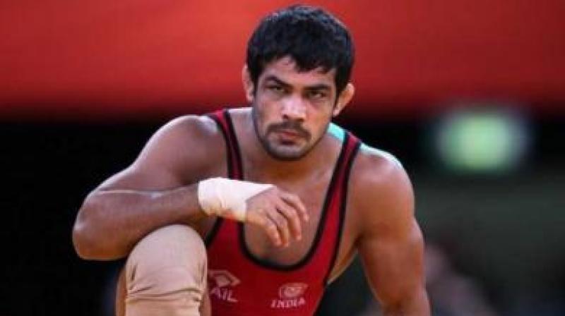Olympic-medallist Sushil Kumar was on Saturday booked by the Delhi Police in connection with his supporters clashing with those of rival wrestler Parveen Rana at the Indira Gandhi Indoor Stadium here. Olympic-medallist Sushil Kumar was on Saturday booked by the Delhi Police in connection with his supporters clashing with those of rival wrestler Parveen Rana at the Indira Gandhi Indoor Stadium here.