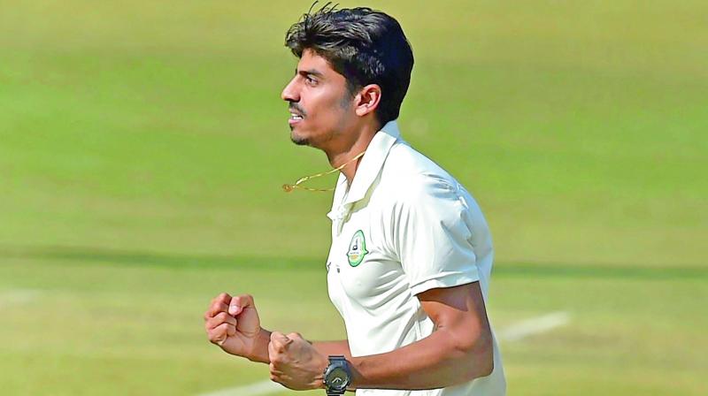 Vidarbha bowler Rajneesh Gurbani celebrates a wicket against Delhi. (Photo: PTI) Vidarbha bowler Rajneesh Gurbani celebrates a wicket against Delhi. (Photo: PTI)