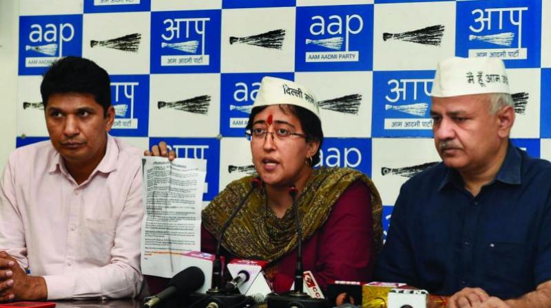 Deputy Chief Minister Manish Sisodia on Friday said Aam Aadmi Party (AAP) will file a defamation case against the former cricketer and BJP candidate from East Delhi constituency Gautam Gambhir for allegedly circulating pamphlets with derogatory and casteist remarks against AAP leader Atishi Marlena. (Photo: File) Deputy Chief Minister Manish Sisodia on Friday said Aam Aadmi Party (AAP) will file a defamation case against the former cricketer and BJP candidate from East Delhi constituency Gautam Gambhir for allegedly circulating pamphlets with derogatory and casteist remarks against AAP leader Atishi Marlena. (Photo: File)