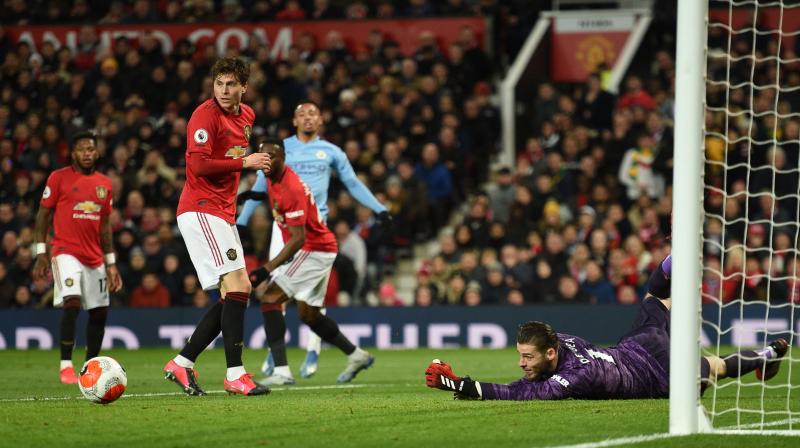 Manchester United;s Spainish goalkeeper David de Gea makes a save during their Premier League derby against Manchester City at Old Trafford on Sunday. AFP Photo Manchester United;s Spainish goalkeeper David de Gea makes a save during their Premier League derby against Manchester City at Old Trafford on Sunday. AFP Photo
