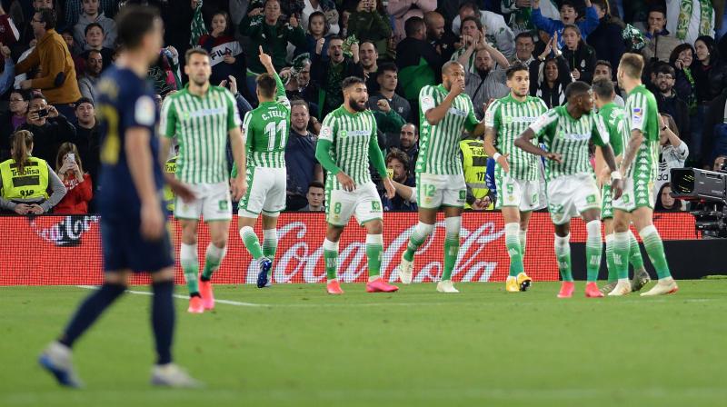 Cristian Tello (3rd from left) celebrates his goal with his teammates as Real Betis handed Ral Madrid one of their biggest defeats in La Liga this season at the Benito Villamarin Stadium in Seville on Sunday. AFP Photo Cristian Tello (3rd from left) celebrates his goal with his teammates as Real Betis handed Ral Madrid one of their biggest defeats in La Liga this season at the Benito Villamarin Stadium in Seville on Sunday. AFP Photo