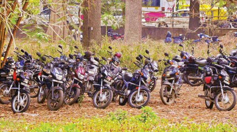 Two-wheelers parked in Cubbon Park in Bengaluru. (Photo: DC) Two-wheelers parked in Cubbon Park in Bengaluru. (Photo: DC)