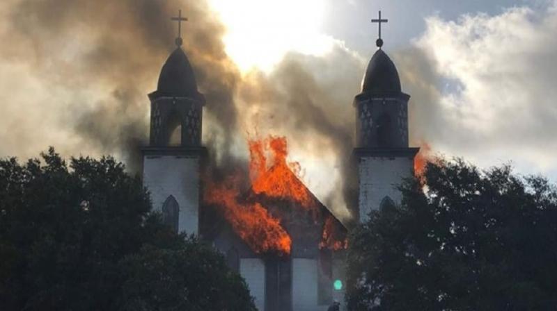 Photos posted on the Austin Catholic diocesan Facebook page show the Church of the Visitation in Westphalia fully involved in flames Monday morning, being reduced to nothing more than ashes. (Photo: Facebook) Photos posted on the Austin Catholic diocesan Facebook page show the Church of the Visitation in Westphalia fully involved in flames Monday morning, being reduced to nothing more than ashes. (Photo: Facebook)