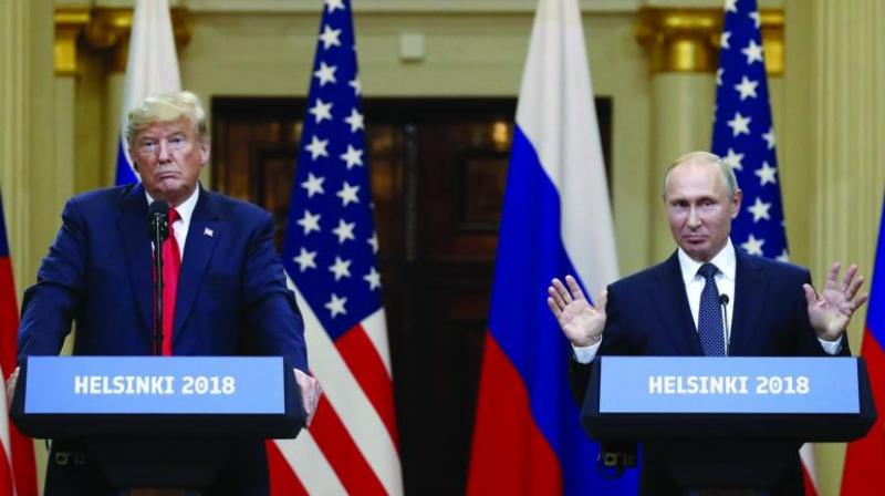Trump has been under bipartisan fire in Washington for failing to publicly confront Putin over the election interference at the press conference that followed their Helsinki talks. (Photo: AP) Trump has been under bipartisan fire in Washington for failing to publicly confront Putin over the election interference at the press conference that followed their Helsinki talks. (Photo: AP)