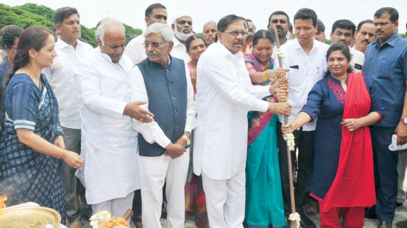 Deputy Chief Minister Dr G. Parameshwar lays the foundation for projects taken up under the Smart City scheme in Tumakuru on Friday. Deputy Chief Minister Dr G. Parameshwar lays the foundation for projects taken up under the Smart City scheme in Tumakuru on Friday.