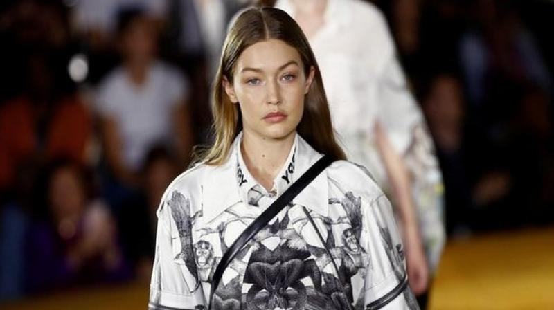 Gigi Hadid blocked French YouTuber Marie Benoliel and escorted her from the runway. (Photo: ANI) Gigi Hadid blocked French YouTuber Marie Benoliel and escorted her from the runway. (Photo: ANI)