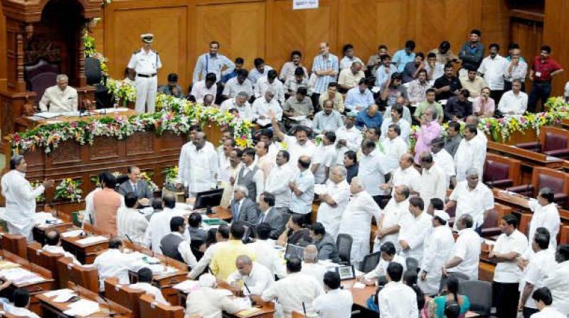 BJP members squatted in the Well of the House, shouting slogans such as ‘down down to the anti-farmer government’, ‘loan waiver should be implemented’. (Representational Image) BJP members squatted in the Well of the House, shouting slogans such as ‘down down to the anti-farmer government’, ‘loan waiver should be implemented’. (Representational Image)
