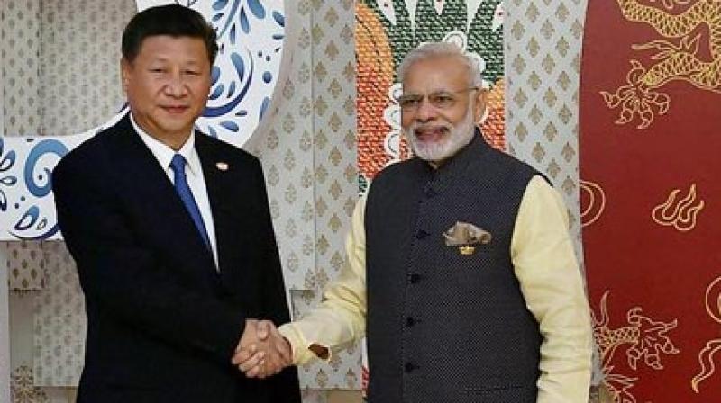 Prime Minister Narendra Modi welcomes Chinese President Xi Jinping for the BRICS Summit in Benaulim, Goa (Photo: AP) Prime Minister Narendra Modi welcomes Chinese President Xi Jinping for the BRICS Summit in Benaulim, Goa (Photo: AP)