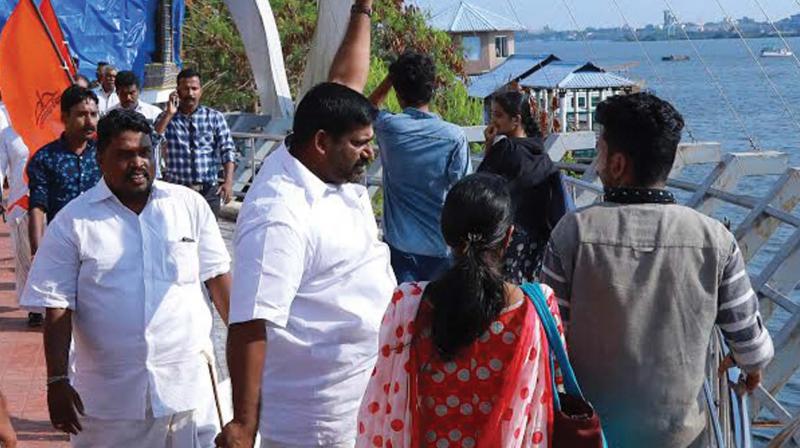 Shiv Sena activists chase away an young couple at Marine Drive in Kochi. (DC file pic) Shiv Sena activists chase away an young couple at Marine Drive in Kochi. (DC file pic)