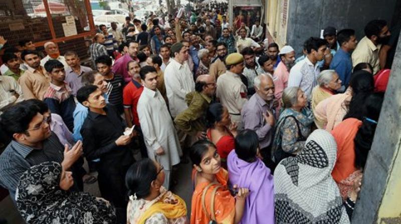 People queue outside a bank to exchange their old Rs 500 and 1000 notes. (Photo: PTI) People queue outside a bank to exchange their old Rs 500 and 1000 notes. (Photo: PTI)