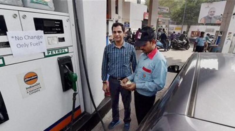 Less than 20 months after a cashback was offered at petrol pumps to promote digital payment, the incentive has been cut to 0.25 per cent from 0.75 per cent, people with knowledge of the development said. (Photo: PTI) Less than 20 months after a cashback was offered at petrol pumps to promote digital payment, the incentive has been cut to 0.25 per cent from 0.75 per cent, people with knowledge of the development said. (Photo: PTI)