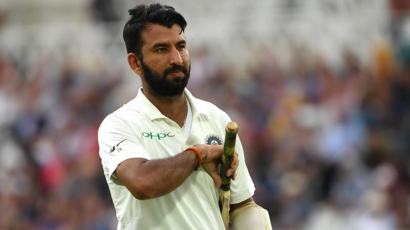 India built a 166-run lead over Australia on the third day of an absorbing opening Test in Adelaide on Saturday with dangerman Cheteshwar Pujara not out 40, although the late wicket of master batsman Virat Kohli gave the home team a glimmer of hope. (Photo: AFP) India built a 166-run lead over Australia on the third day of an absorbing opening Test in Adelaide on Saturday with dangerman Cheteshwar Pujara not out 40, although the late wicket of master batsman Virat Kohli gave the home team a glimmer of hope. (Photo: AFP)