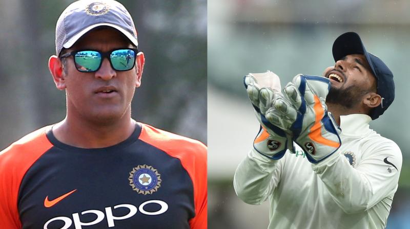 Rishabh Pant on Saturday took six catches during Australia's first innings to equal predecessor Mahendra Singh Dhoni's record of most catches by an Indian wicketkeeper in a Test innings. (Photo: AP / AFP) Rishabh Pant on Saturday took six catches during Australia's first innings to equal predecessor Mahendra Singh Dhoni's record of most catches by an Indian wicketkeeper in a Test innings. (Photo: AP / AFP)