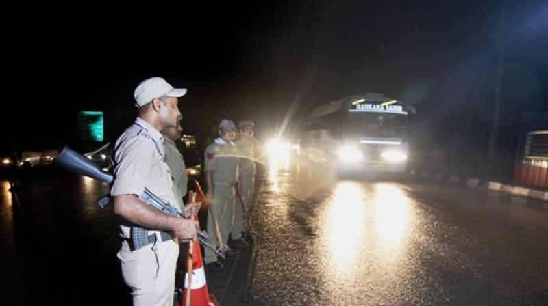 Security personnel keeping a vigil as pilgrims head towards Kashmir to pay obeisance at the Amarnath cave shrine, days after militant attack on pilgrims in Anantnag, in Jammu on Wednesday. (Photo: PTI) Security personnel keeping a vigil as pilgrims head towards Kashmir to pay obeisance at the Amarnath cave shrine, days after militant attack on pilgrims in Anantnag, in Jammu on Wednesday. (Photo: PTI)