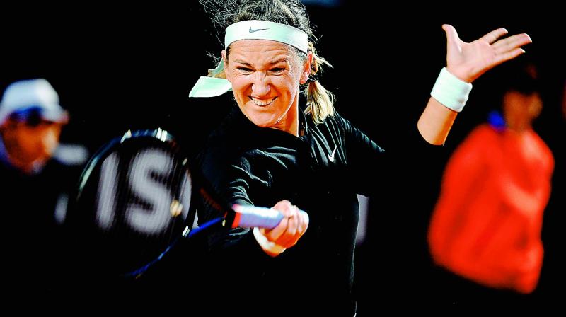 Victoria Azarenka plays a forehand return to Elina Svitolina during their WTA Masters tournament tennis match in Rome on Wednesday. (Photo - AFP) Victoria Azarenka plays a forehand return to Elina Svitolina during their WTA Masters tournament tennis match in Rome on Wednesday. (Photo - AFP)
