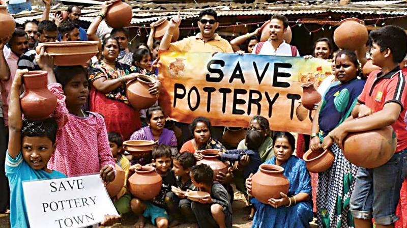 Activist Kumar Jahgirdhar leads a protest at Pottery Town Activist Kumar Jahgirdhar leads a protest at Pottery Town