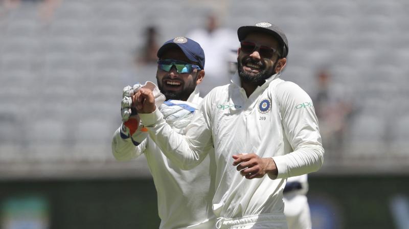 India skipper Virat Kohli maintained his top spot, while young wicketkeeper-batsman Rishabh Pant and pacer Jasprit Bumrah attained their career-best positions in the latest ICC Test rankings. (Photo: AP) India skipper Virat Kohli maintained his top spot, while young wicketkeeper-batsman Rishabh Pant and pacer Jasprit Bumrah attained their career-best positions in the latest ICC Test rankings. (Photo: AP)