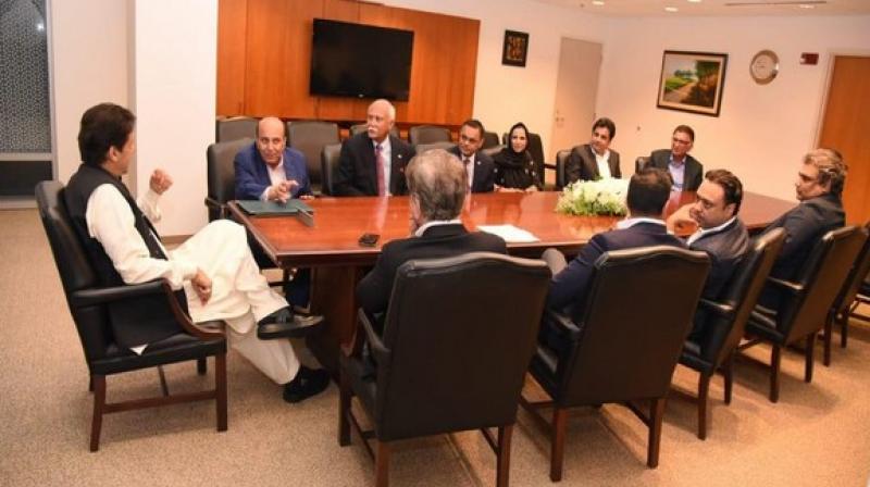 Imran Khan meeting Pakistani businessmen in Washington. (Photo: Pakistan Tehreek-e-Insaaf's Twitter) Imran Khan meeting Pakistani businessmen in Washington. (Photo: Pakistan Tehreek-e-Insaaf's Twitter)