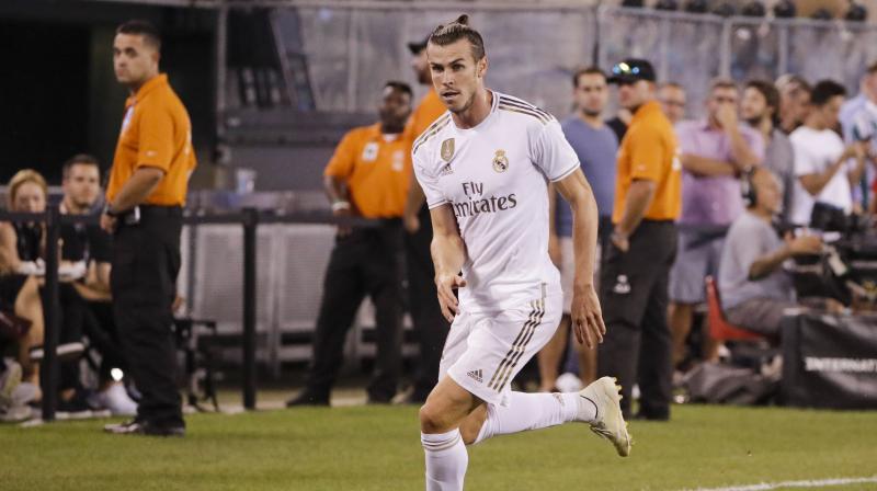 Bale, who has been strongly linked with a move away from the Spanish club, missed the trip to Munich for the Audi Cup pre-season tournament because he was not fit and had stayed in Madrid to train, Zidane said on Tuesday. (Photo: AP) Bale, who has been strongly linked with a move away from the Spanish club, missed the trip to Munich for the Audi Cup pre-season tournament because he was not fit and had stayed in Madrid to train, Zidane said on Tuesday. (Photo: AP)