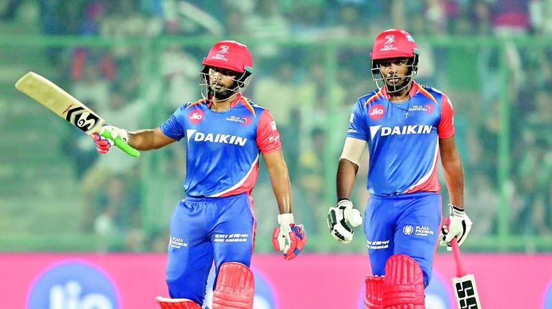 Rishab Pant (left) raises his bat to celebrate his half-century with Sanju Samson looks on during their match against Gujarat Lions in New Delhi on Thursday. (Right) Suresh Raina continued his good run with the bat scoring a whirlwhind 77 to help his team to a formidable total. (Photo: BCCI) Rishab Pant (left) raises his bat to celebrate his half-century with Sanju Samson looks on during their match against Gujarat Lions in New Delhi on Thursday. (Right) Suresh Raina continued his good run with the bat scoring a whirlwhind 77 to help his team to a formidable total. (Photo: BCCI)