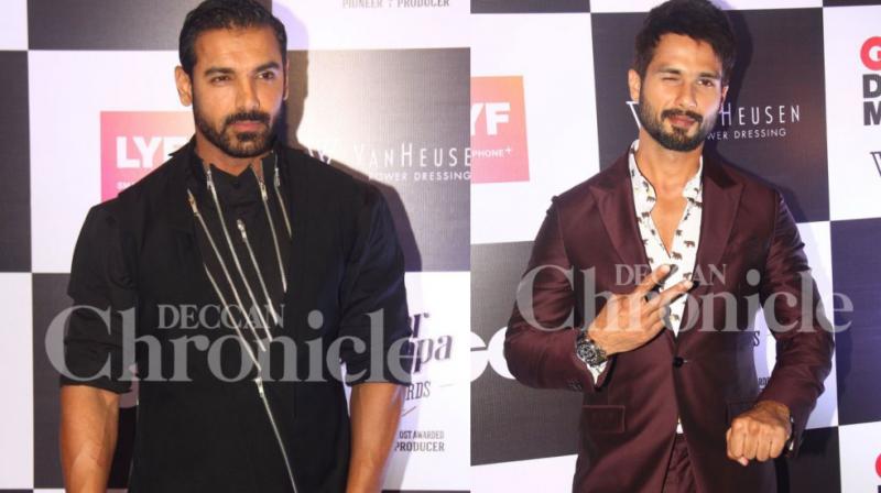 John Abraham and Shahid Kapoor at an event. John Abraham and Shahid Kapoor at an event.