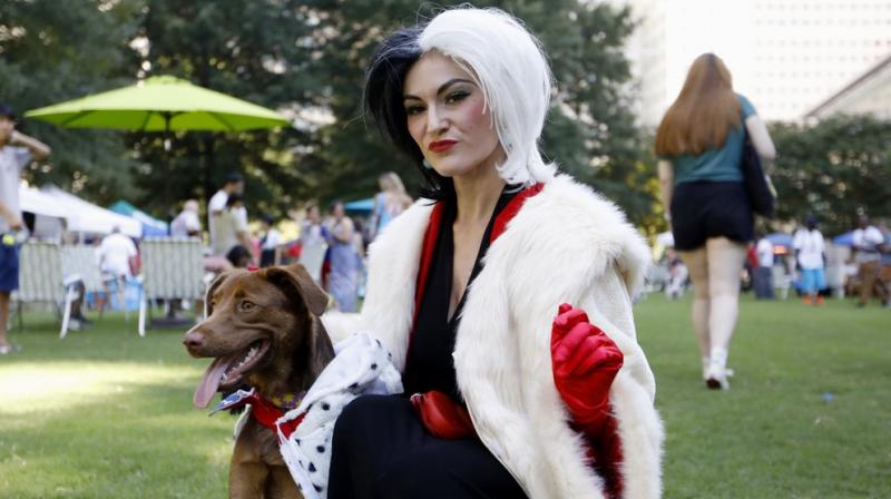 Doggy Con drew hundreds of dog owners and spectators Saturday to an Atlanta park for their own small cosplay convention. (Photo: AP) Doggy Con drew hundreds of dog owners and spectators Saturday to an Atlanta park for their own small cosplay convention. (Photo: AP)