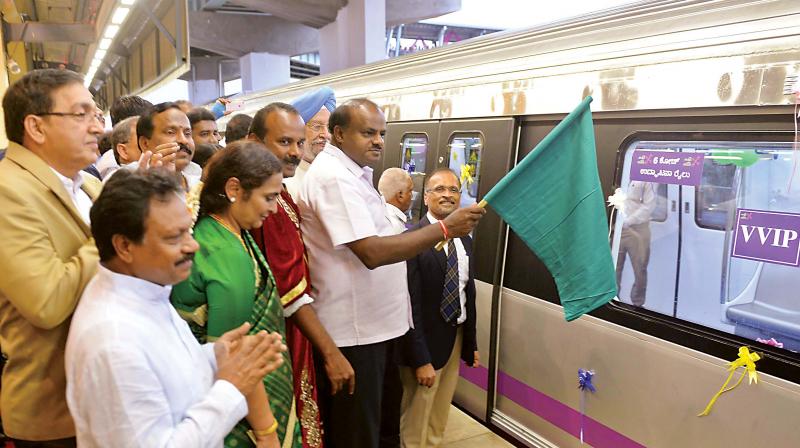 A six coach metro rail leaves the Byappanahalli station on Friday. It was flagged off by Chief Minister H.D. Kumaraswamy, Union Minister of State for Housing and Urban Affairs Hardeep Singh Puri and Mayor Sampath Raj. (Image: DC) A six coach metro rail leaves the Byappanahalli station on Friday. It was flagged off by Chief Minister H.D. Kumaraswamy, Union Minister of State for Housing and Urban Affairs Hardeep Singh Puri and Mayor Sampath Raj. (Image: DC)
