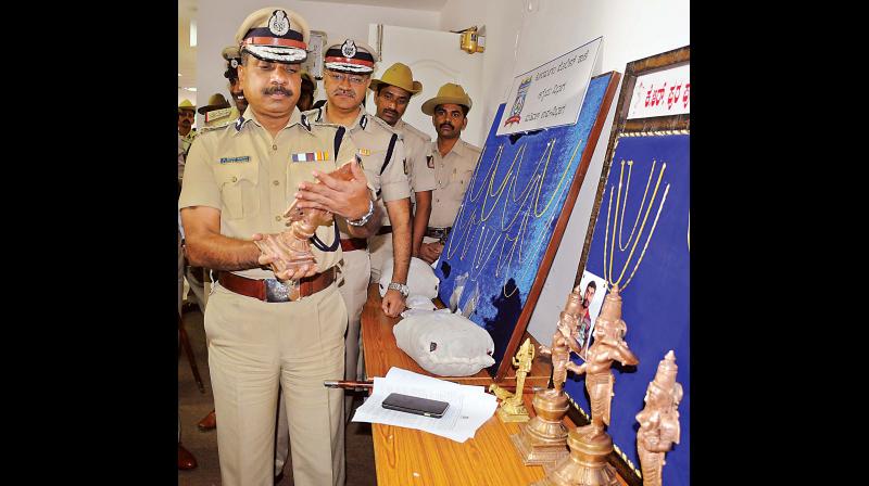 The K R Puram police have registered a case and recovered six ancient Panchaloha idols, 200 grams of gold ornaments, worth Rs 6 lakh, and two bikes. The K R Puram police have registered a case and recovered six ancient Panchaloha idols, 200 grams of gold ornaments, worth Rs 6 lakh, and two bikes.