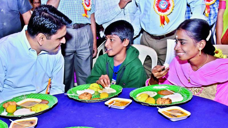 East Godavari District Collector Karthikeya Mishra with children suffering from HIV on the occasion of World AIDS Day at his camp office in Kakinada on Friday. (Photo: DC) East Godavari District Collector Karthikeya Mishra with children suffering from HIV on the occasion of World AIDS Day at his camp office in Kakinada on Friday. (Photo: DC)