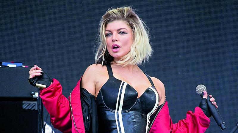 Former Black Eyed Peas member Fergie Former Black Eyed Peas member Fergie