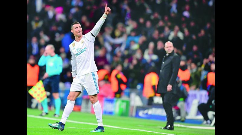 Cristiano Ronaldo of Real Madrid celebrates scoring against Borussia Dortmund at Santiago Bernabeu in Madrid. Real won 3-2. (Photo: AFP) Cristiano Ronaldo of Real Madrid celebrates scoring against Borussia Dortmund at Santiago Bernabeu in Madrid. Real won 3-2. (Photo: AFP)