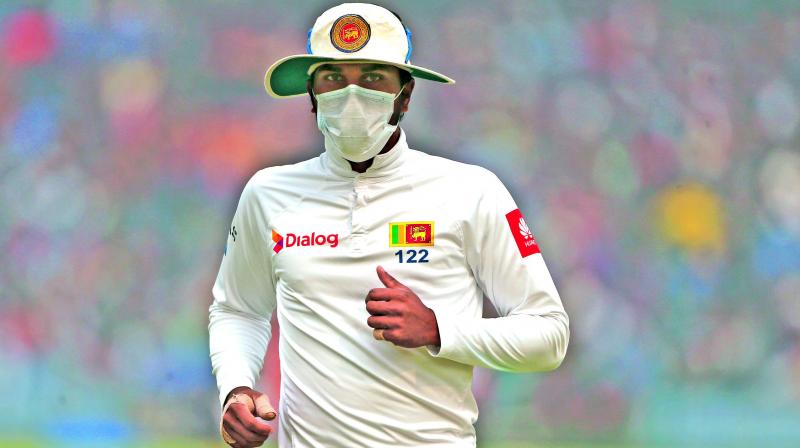 The Sri Lankan players were seen fielding while wearing anti-pollution masks during India’s batting with most of their players complaining of breathlessness. The Sri Lankan players were seen fielding while wearing anti-pollution masks during India’s batting with most of their players complaining of breathlessness.