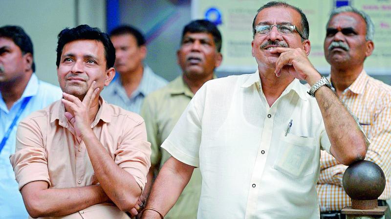 Investors reacts while watching the stock prices at a screen on the facade of the BSE building in Mumbai on Monday. (Photo: PTI) Investors reacts while watching the stock prices at a screen on the facade of the BSE building in Mumbai on Monday. (Photo: PTI)