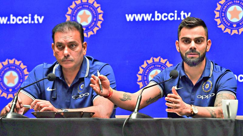 India coach Ravi Shastri and Virat Kohli meet the press before embarking on the South Africa tour. India coach Ravi Shastri and Virat Kohli meet the press before embarking on the South Africa tour.