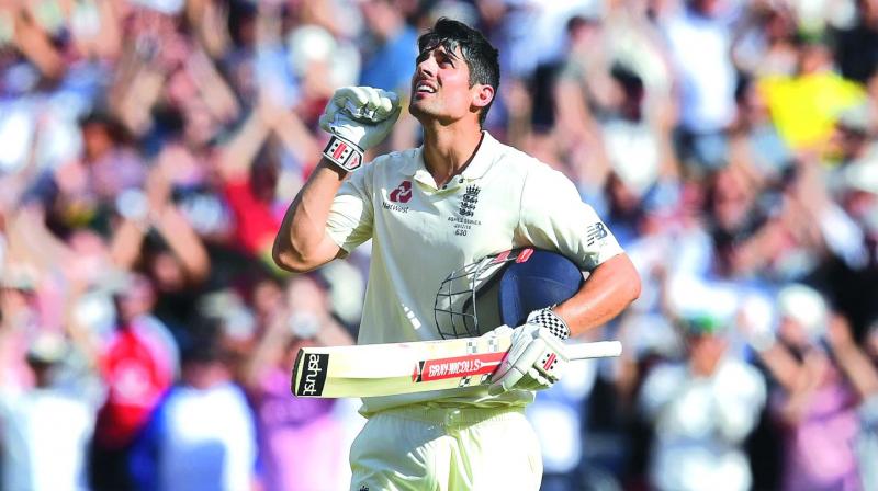 Englands Alastair Cook Celebrates His Century Against Australia In Melbourne Photo AFP Englands Alastair Cook Celebrates His Century Against Australia In Melbourne Photo AFP