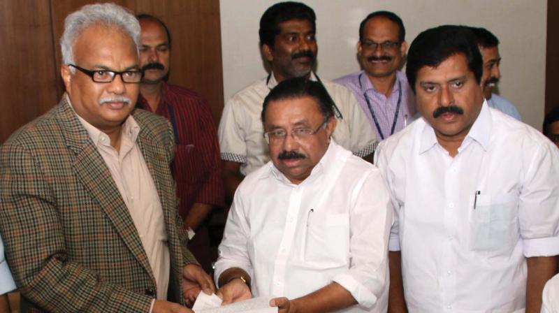 The chief of Central team for Ockhi disaster relief, Bipin Mallick, gets a set of demands from UDF, headed by KPCC president M.M. Hassan, in Thiruvananthapuram on Wednesday. V. S. Sivakumar, MLA is also seen. (Photo: G.G. Abhijith) The chief of Central team for Ockhi disaster relief, Bipin Mallick, gets a set of demands from UDF, headed by KPCC president M.M. Hassan, in Thiruvananthapuram on Wednesday. V. S. Sivakumar, MLA is also seen. (Photo: G.G. Abhijith)