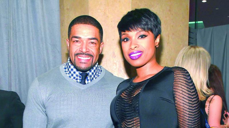 David Otunga and Jennifer Hudson at an event. David Otunga and Jennifer Hudson at an event.