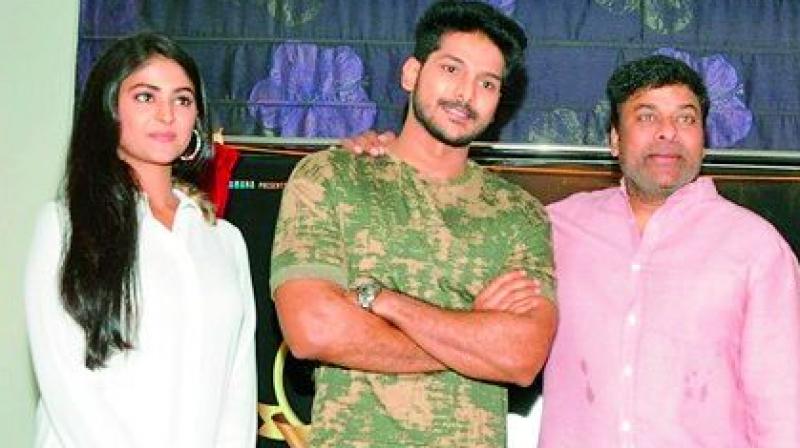 Chiranjeevi with Ranjith and Palak Lalwani. Chiranjeevi with Ranjith and Palak Lalwani.