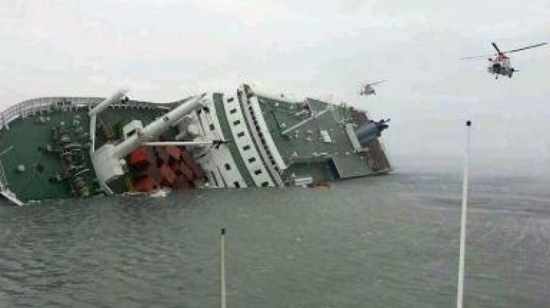 China: continues examining oil spill from tanker