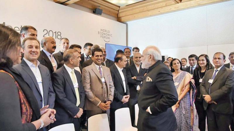 Prime Minister Narendra Modi interacts with Indian CEOs in Davos. (Photo:PTI) Prime Minister Narendra Modi interacts with Indian CEOs in Davos. (Photo:PTI)
