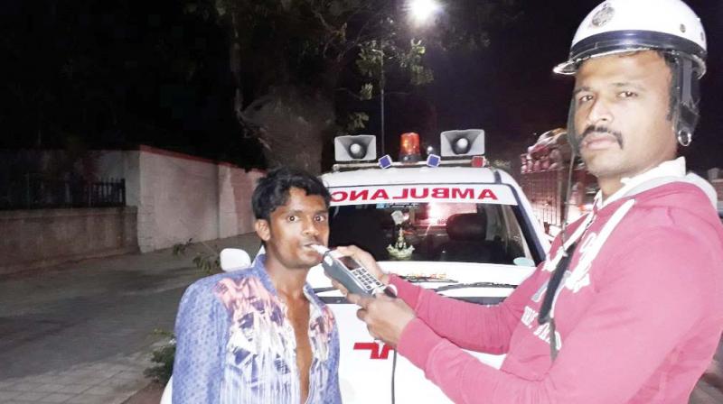Jagadish, an ambulance driver caught driving drunk in Bengaluru on Saturday. (Photo:DC) Jagadish, an ambulance driver caught driving drunk in Bengaluru on Saturday. (Photo:DC)