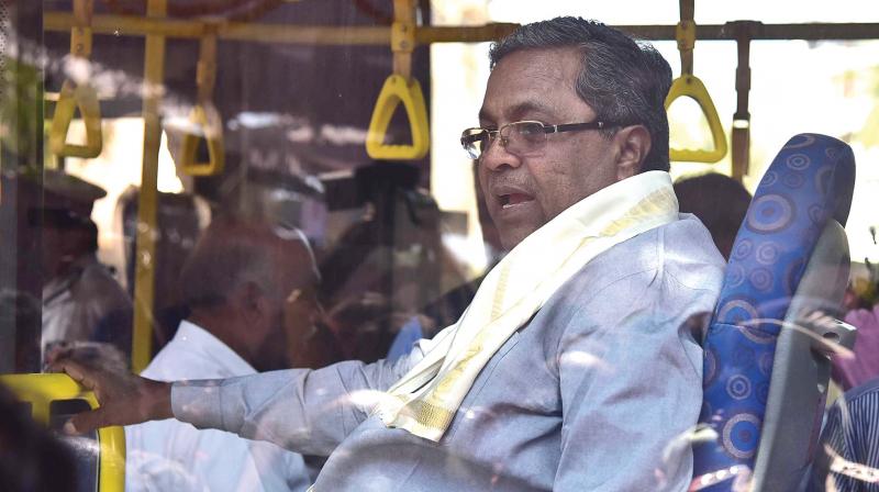 Chief Minister Siddaramaiah arrives to inaugurate the remodelled Church Street in a BMTC Volvo bus on Thursday. (Photo:DC) Chief Minister Siddaramaiah arrives to inaugurate the remodelled Church Street in a BMTC Volvo bus on Thursday. (Photo:DC)