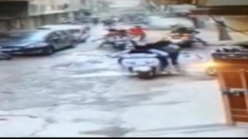CCTV footage shows 10 bikes with two men on each rush in one after the other and surround Ashish, who had just stepped out of the gym, then stab him repeatedly. (Photo: NDTV screengrab) CCTV footage shows 10 bikes with two men on each rush in one after the other and surround Ashish, who had just stepped out of the gym, then stab him repeatedly. (Photo: NDTV screengrab)