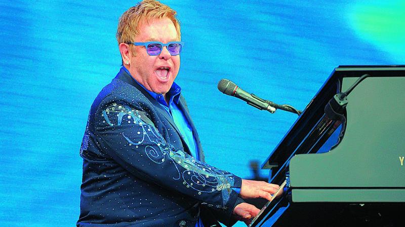 Elton John screams at fan during gig