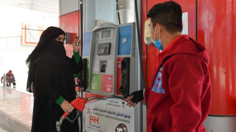 Mervat Bukhari becomes the first Saudi woman to work at a gas station, something unimaginable not long ago. (Photo: AFP) Mervat Bukhari becomes the first Saudi woman to work at a gas station, something unimaginable not long ago. (Photo: AFP)