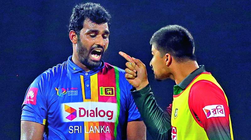 Bangladesh reserve Nurul Hasan points a finger at Sri Lanka captain Thisara Perera. (Photo:AP) Bangladesh reserve Nurul Hasan points a finger at Sri Lanka captain Thisara Perera. (Photo:AP)