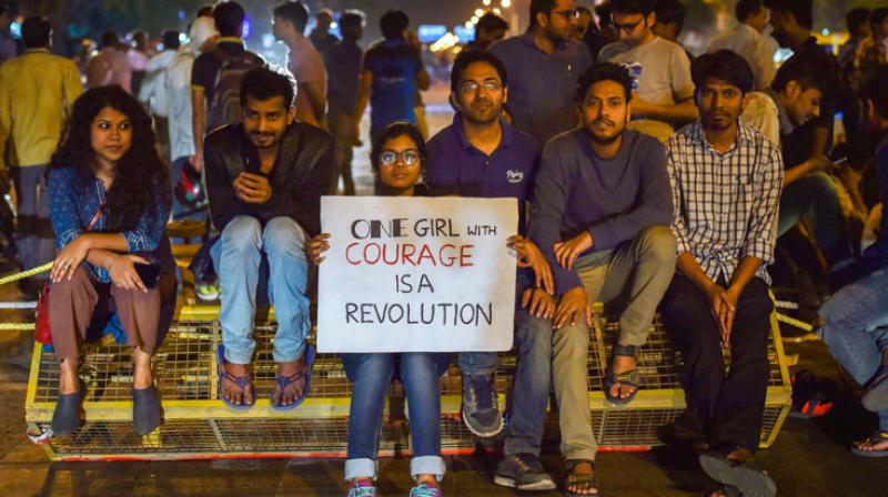 JNU students took a protest march to the Vasant Kunj police station on Monday demanding professor Atul Johri's arrest. (Photo: PTI) JNU students took a protest march to the Vasant Kunj police station on Monday demanding professor Atul Johri's arrest. (Photo: PTI)