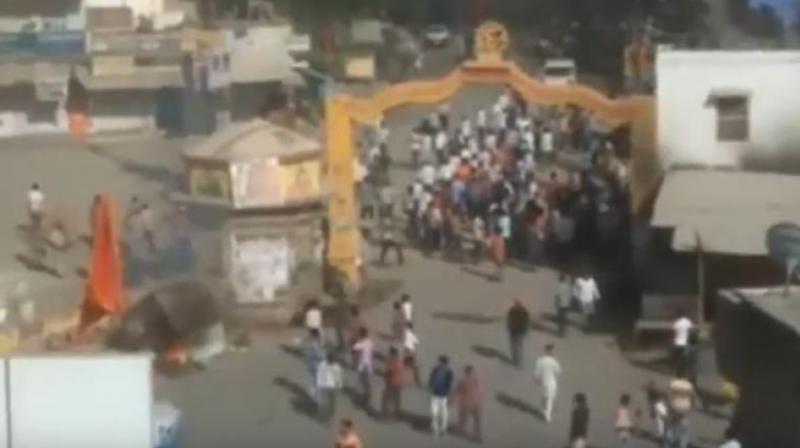 Police swung into action soon and dispersed the stone-pelting mob by arresting some people from the two sides. (Photo: YouTube screengrab) Police swung into action soon and dispersed the stone-pelting mob by arresting some people from the two sides. (Photo: YouTube screengrab)